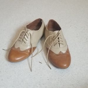 Brown wingtip shoes